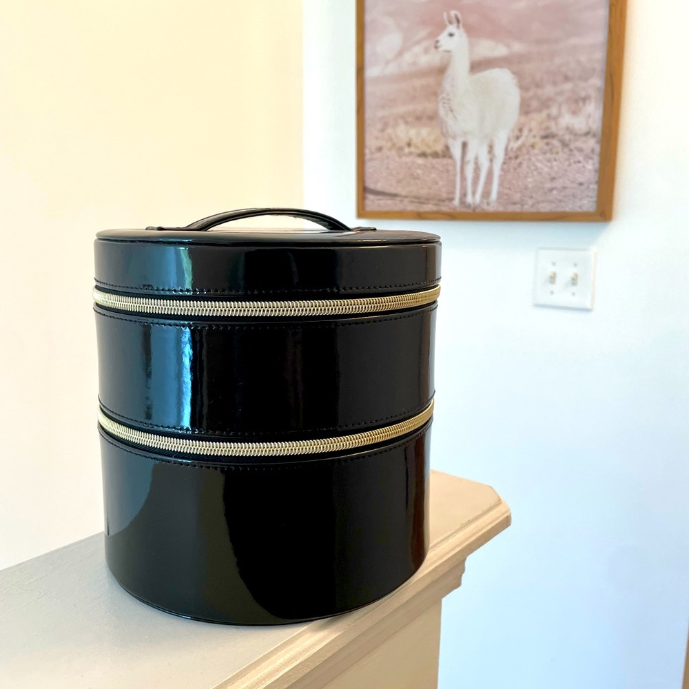 Brand new Lancome 2 tiered makeup organizer with mirror on top half.